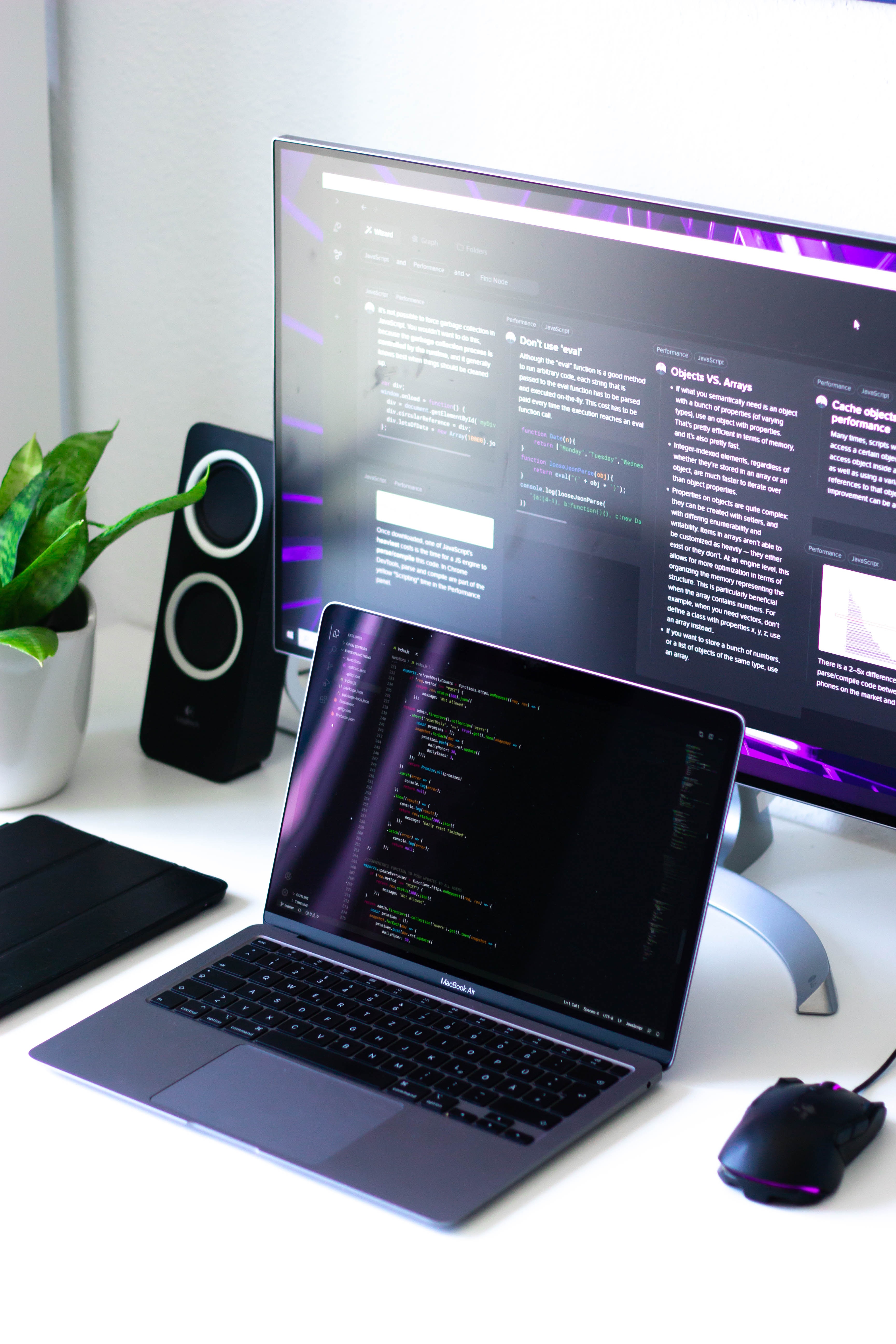 laptop and monitor on desk